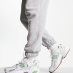 New Balance 530 trainers in white & green